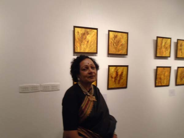 Artist and Poet Kusum Shukla with her The Majestic Tiger Series of art works Artist and Poet Kusum Shukla with her The Majestic Tiger Series of art works