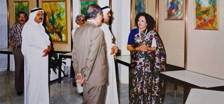 The Passport, the Artist, and the Question of Identity Kusum Shukla with guests at her art show in Doha Ramada